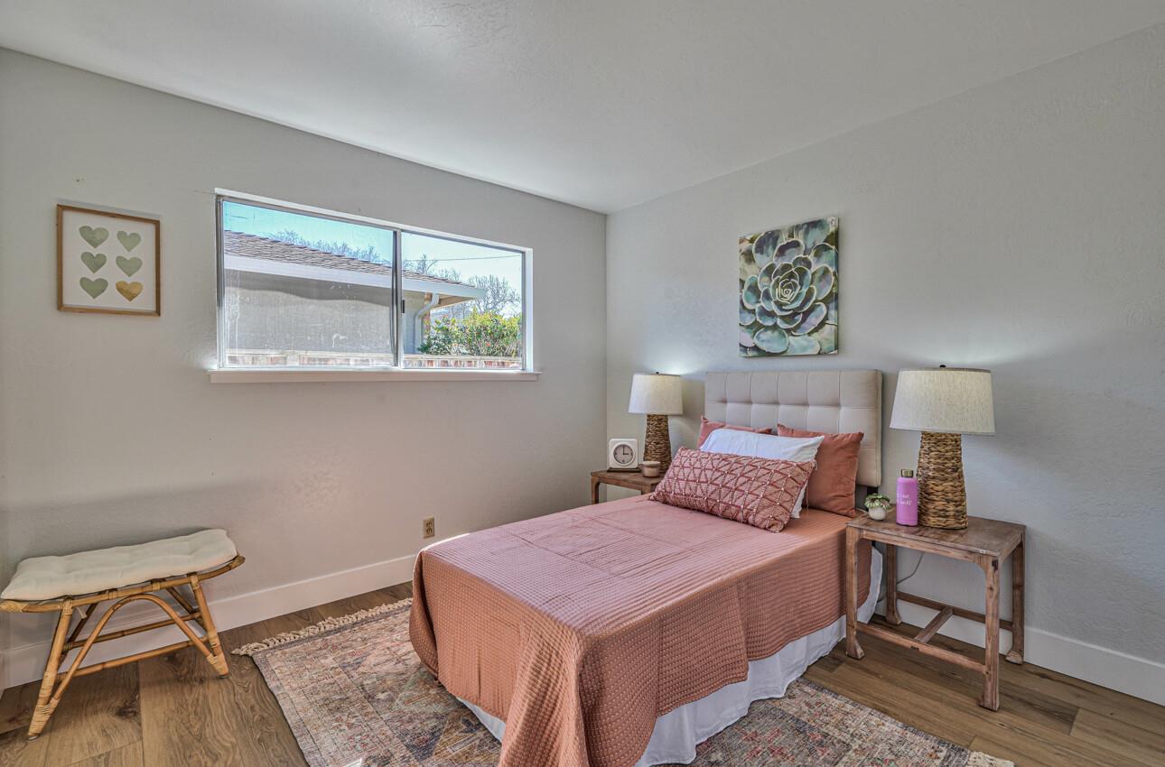 242 Howes Drive Los Gatos, CA 95032 - Photo 24 of 37 a bedroom with a bed and a desk