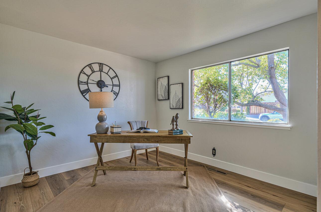 242 Howes Drive Los Gatos, CA 95032 - Photo 28 of 37 a workspace with furniture and a potted plant