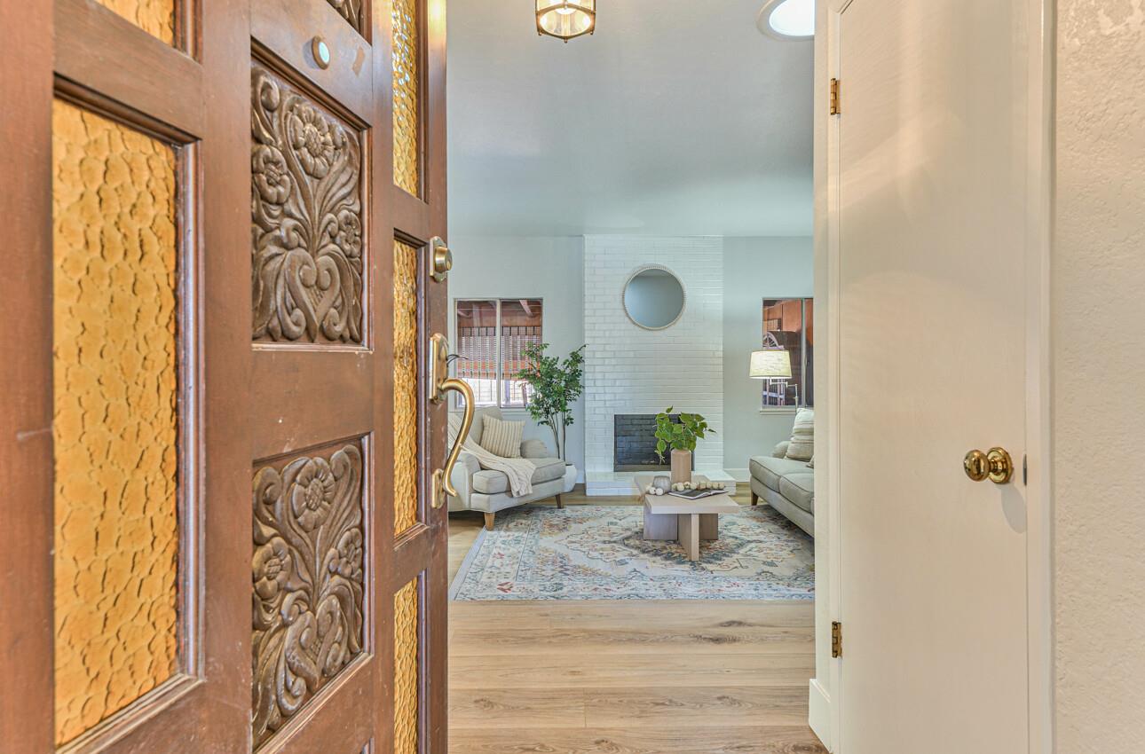 242 Howes Drive Los Gatos, CA 95032 - Photo 4 of 37 a living room with furniture and a window