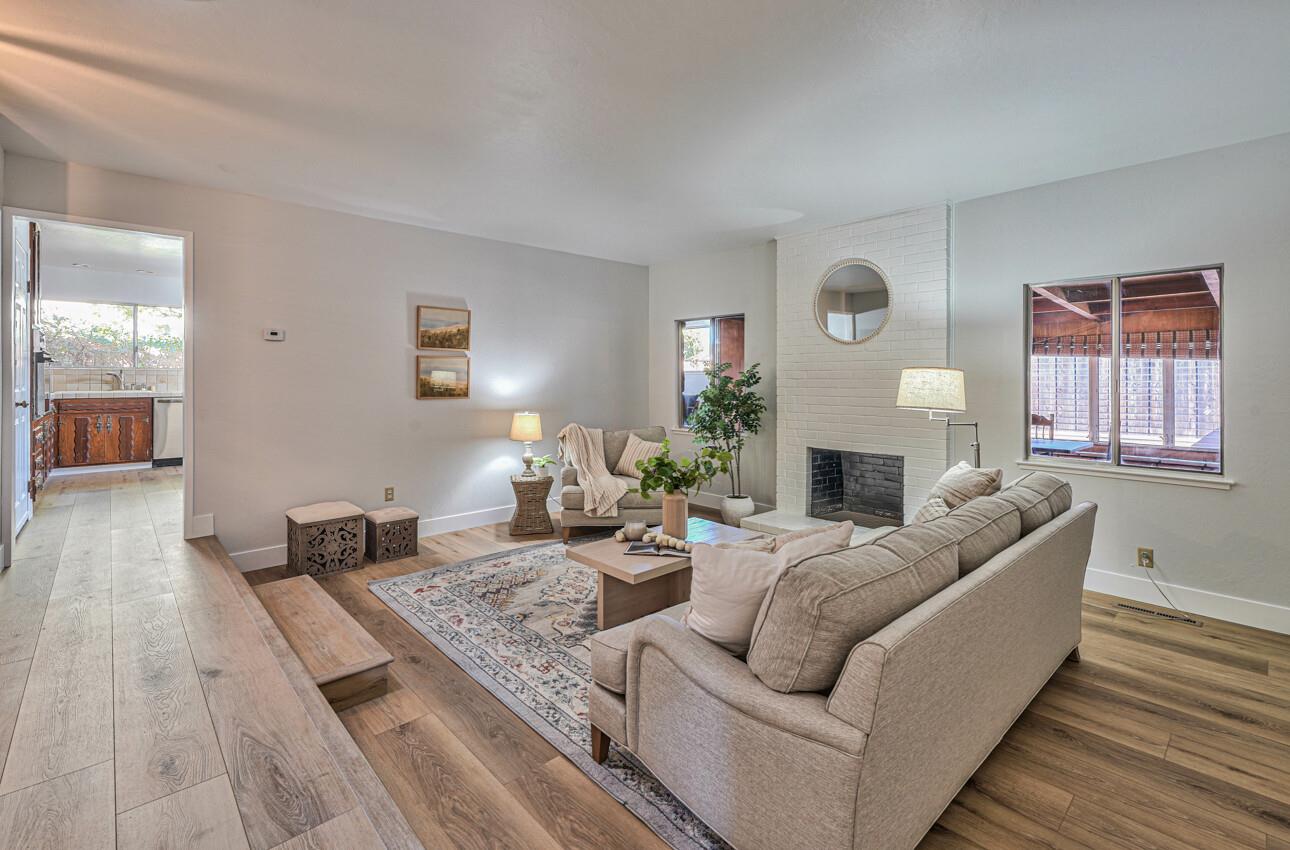 242 Howes Drive Los Gatos, CA 95032 - Photo 6 of 37 a living room with furniture and a fireplace