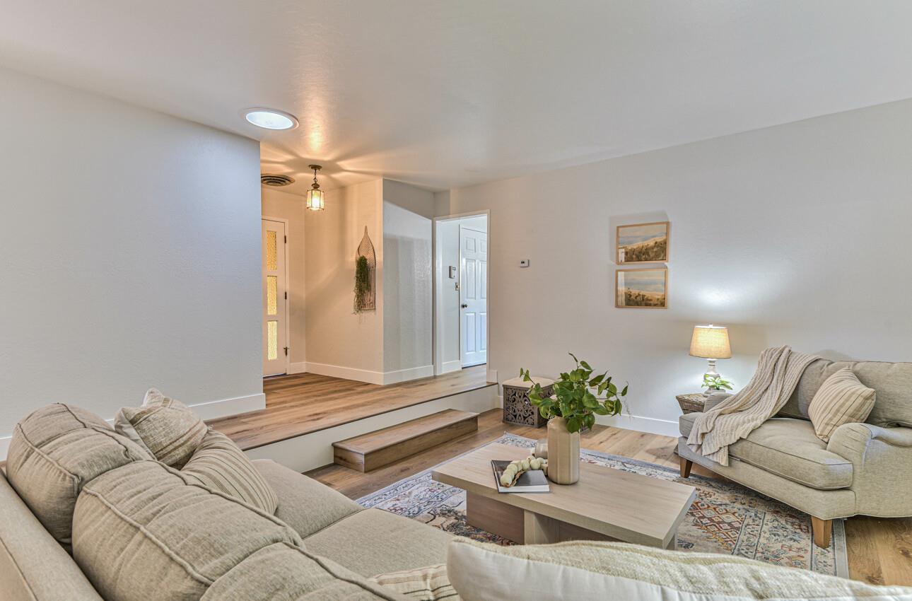 242 Howes Drive Los Gatos, CA 95032 - Photo 7 of 37 a living room with furniture and a potted plant