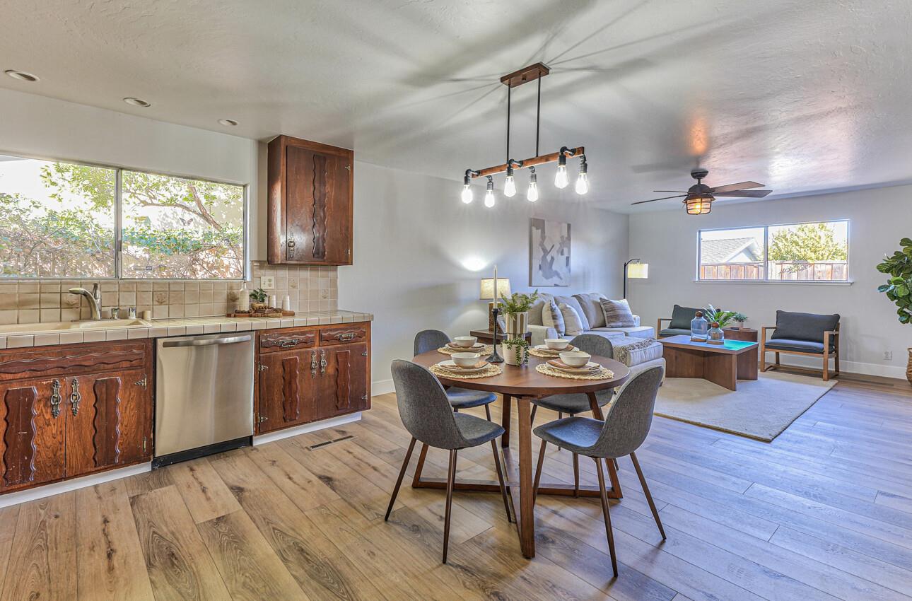242 Howes Drive Los Gatos, CA 95032 - Photo 9 of 37 a view of a dining room with furniture window and wooden floor