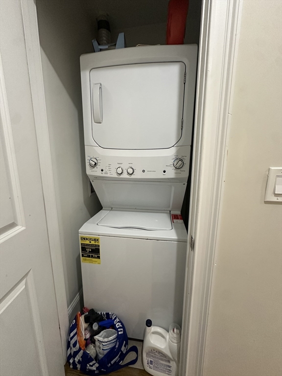 56 Cedar Street, Unit 2 Boston, MA 02119 - Photo 8 of 16 a utility room with dryer and washer