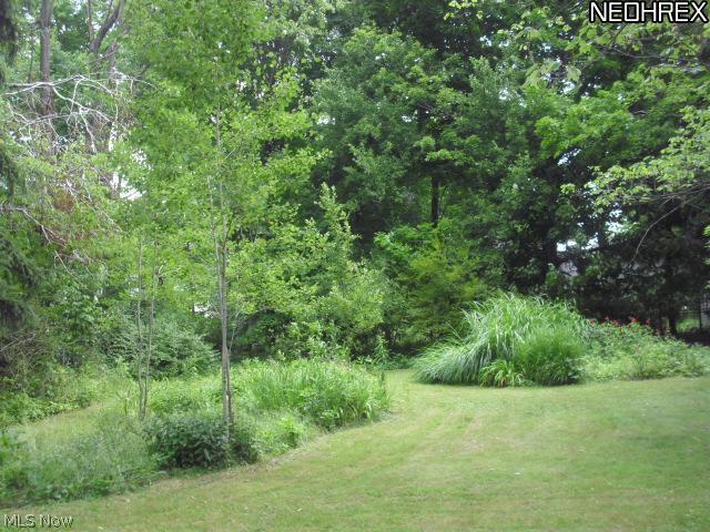 116 Mapleridge Road Chagrin Falls, OH 44022 - Photo 2 of 10 Charming gardens, very private 1/3 of a acre wooded lot