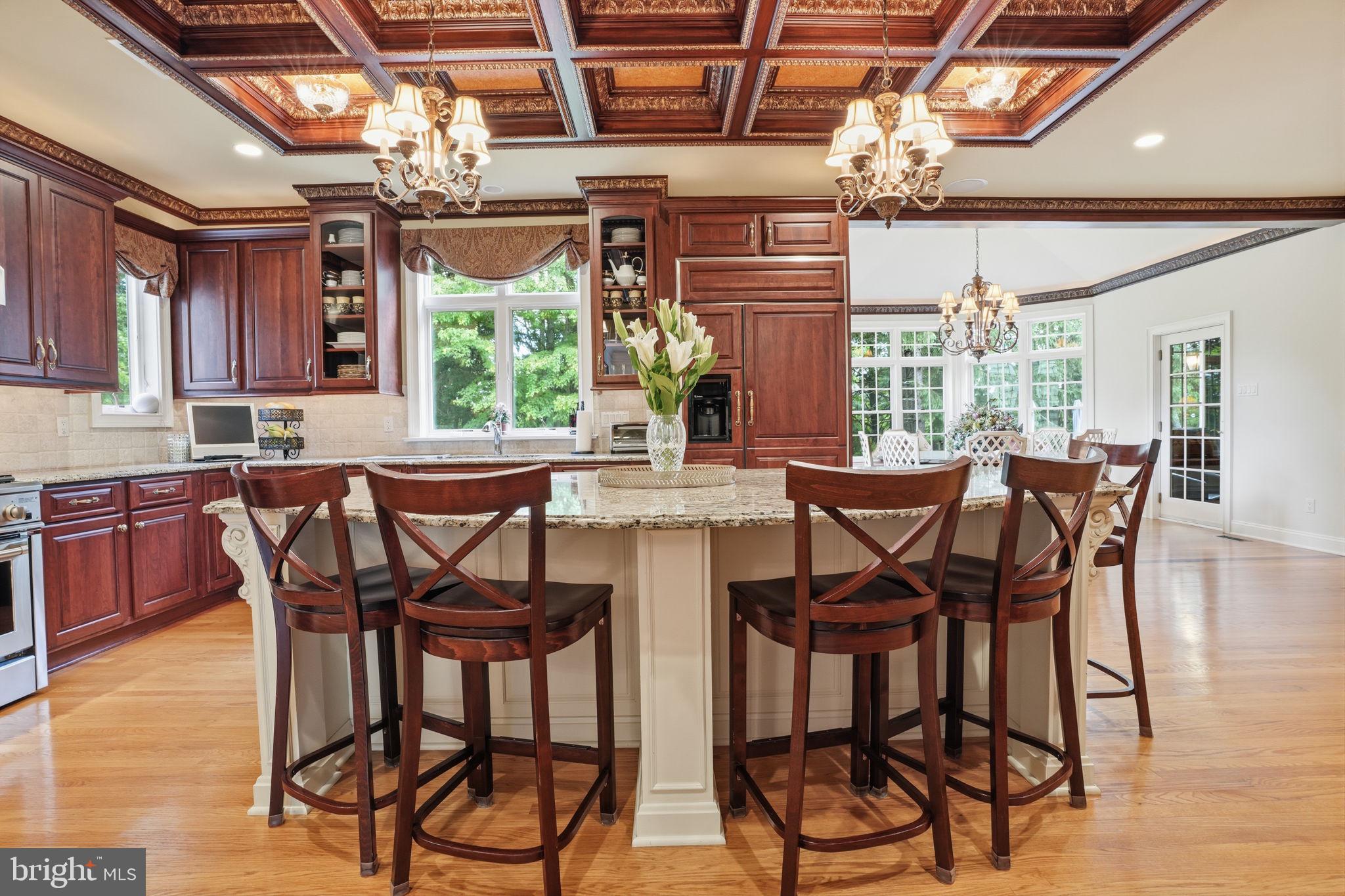 1588 Wrightstown Road Newtown, PA 18940 - Photo 31 of 81 a dining room with furniture a chandelier and wooden floor