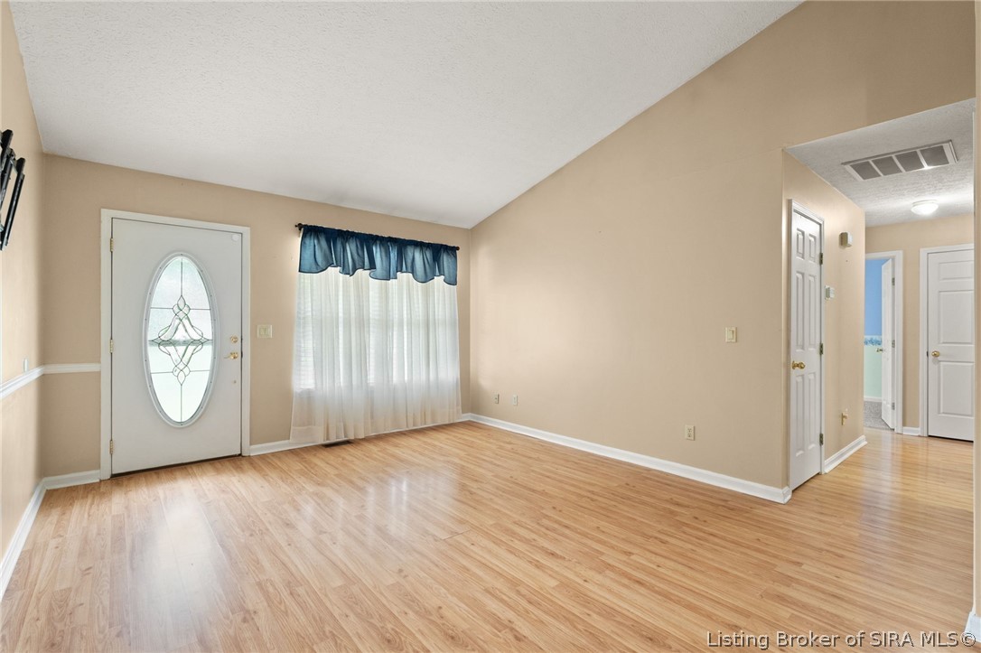 1950 Andrew Court Corydon, IN 47112 - Photo 2 of 47 Spacious living room with vaulted ceiling