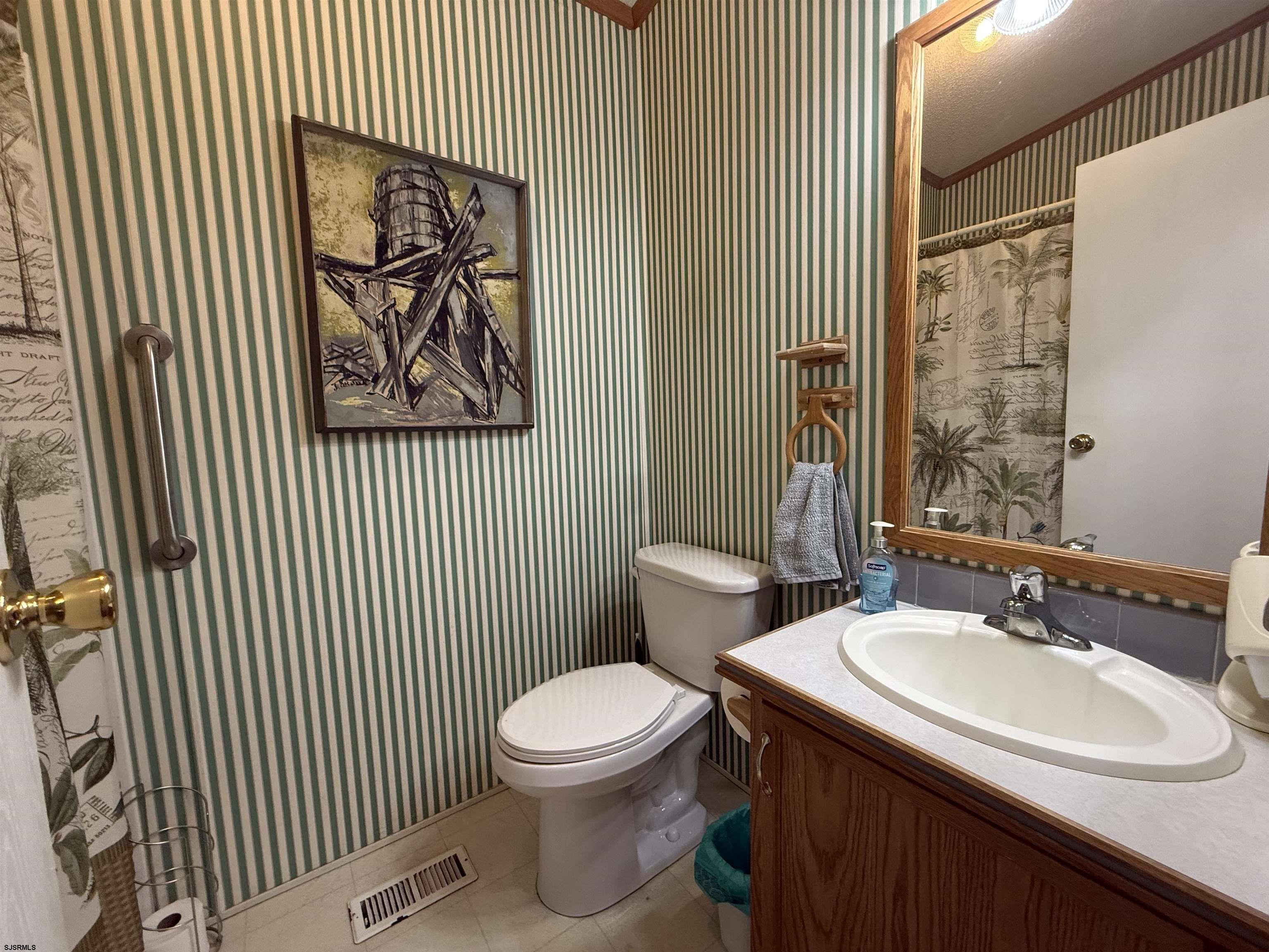 141 Country Lane Buena, NJ 08310 - Photo 11 of 24 a bathroom with a sink toilet and shower