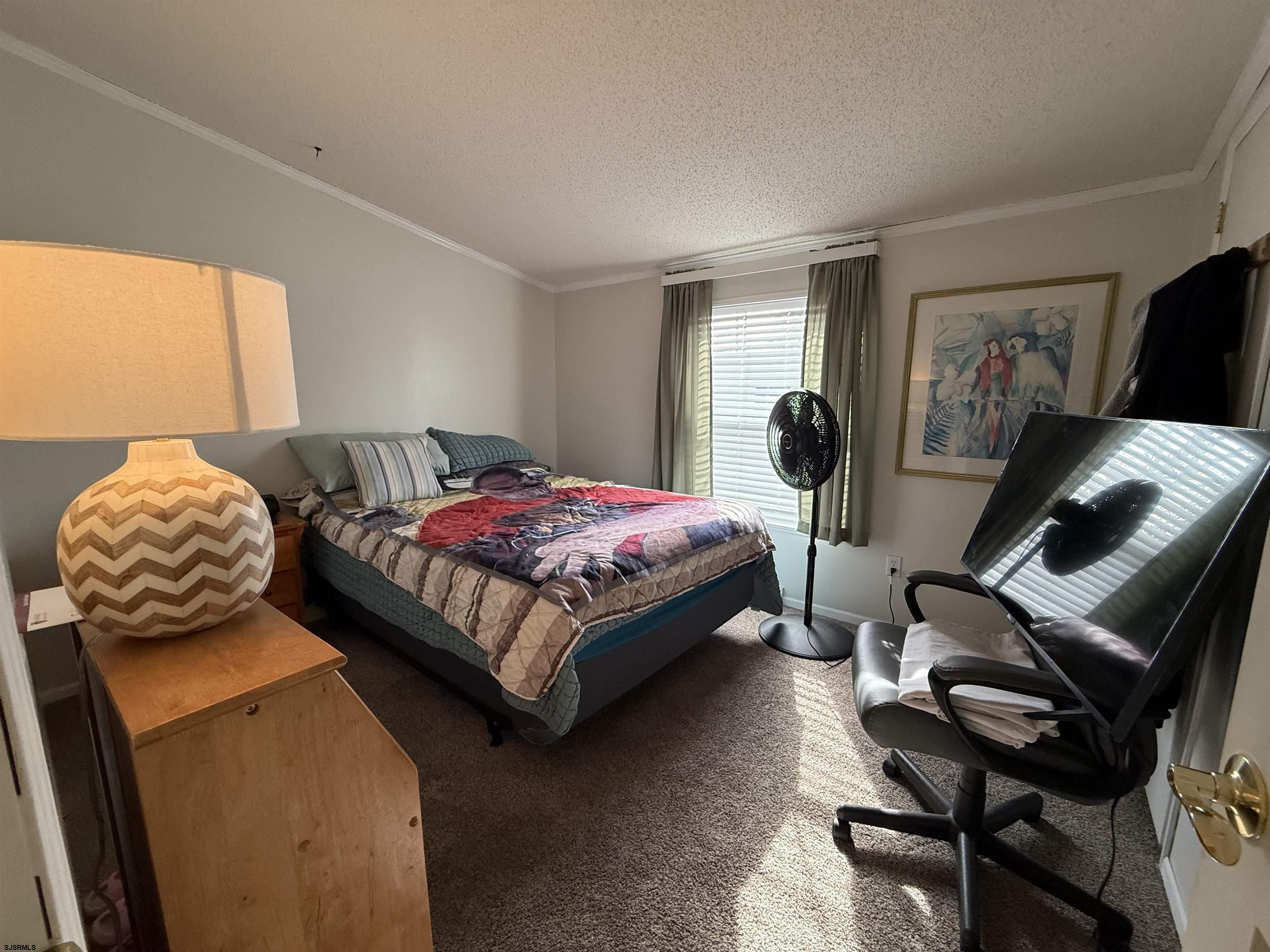 141 Country Lane Buena, NJ 08310 - Photo 15 of 24 a bedroom with a bed and wooden floor