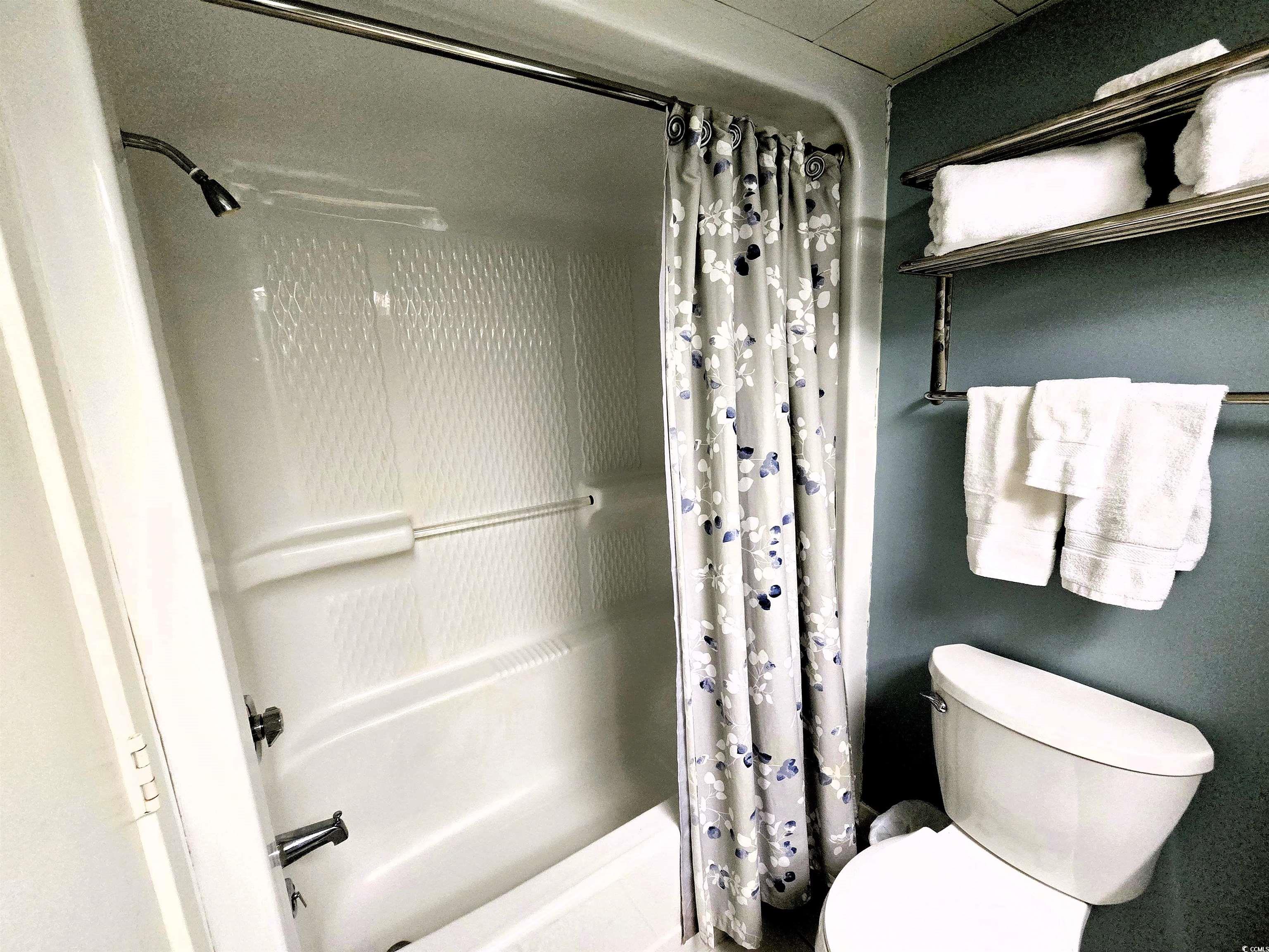 161 Seawatch Drive, Unit 414 Myrtle Beach, SC 29572 - Photo 10 of 15 Full bath with shower / bathtub combination with curtain and toilet