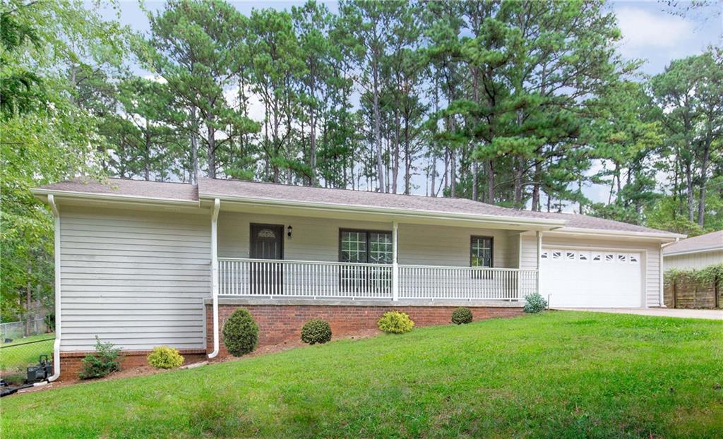 Beautifully renovated 4 bedroom, 2 bath ranch on finished 1/2 basement. Charming front AND rear porches. 