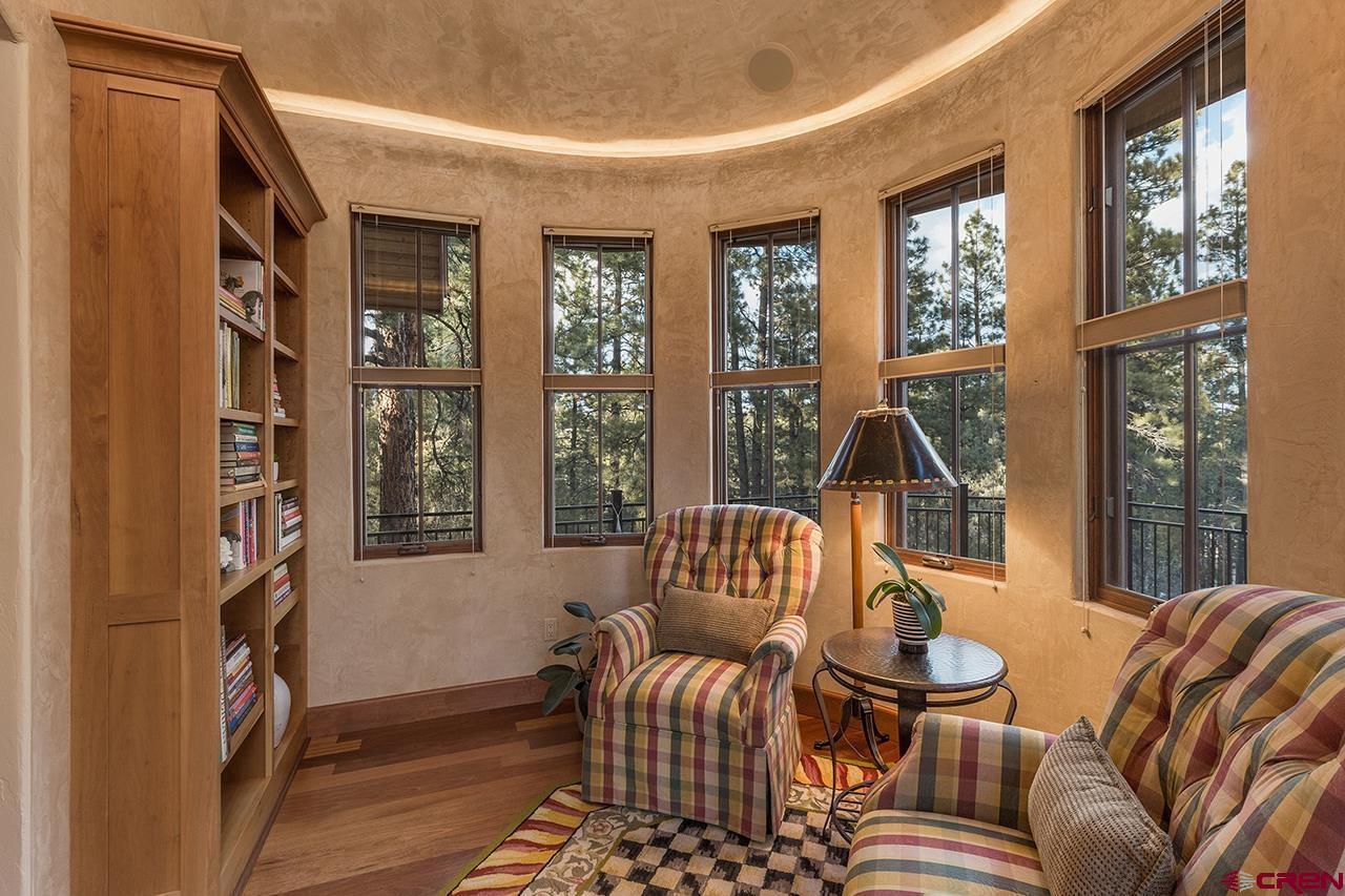 304 Peak Trail Hesperus, CO 81326 - Photo 19 of 35 a living room with furniture and a window