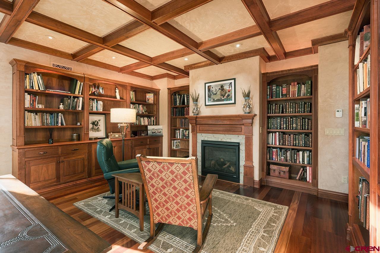 304 Peak Trail Hesperus, CO 81326 - Photo 22 of 35 a living room with furniture and a fireplace