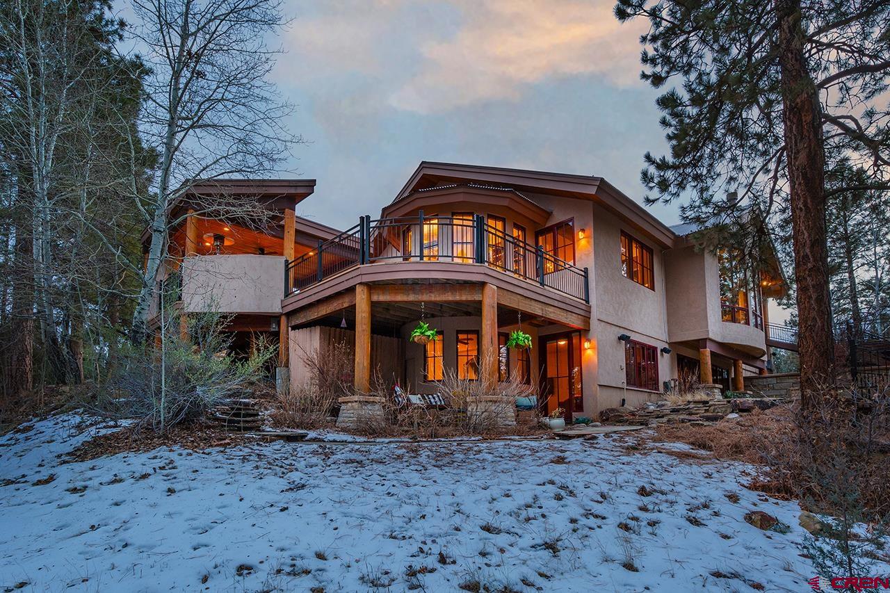 304 Peak Trail Hesperus, CO 81326 - Photo 4 of 35 a front view of a house with garden
