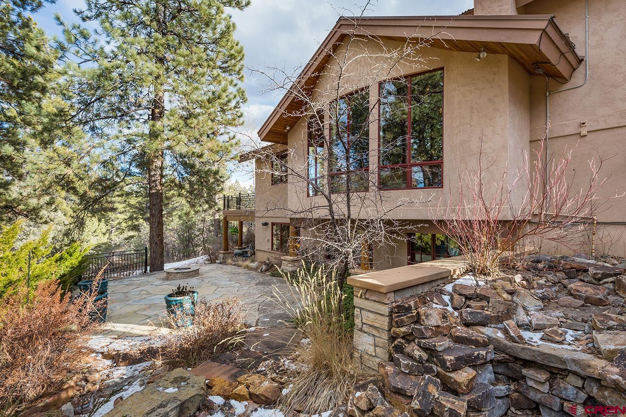 304 Peak Trail Hesperus, CO 81326 - Photo 8 of 35 a backyard of a house with outdoor seating