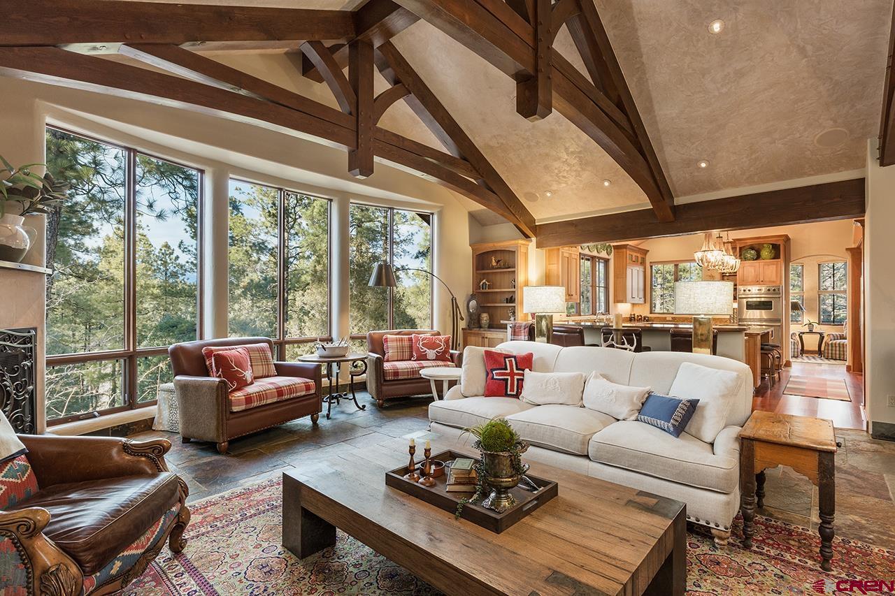 304 Peak Trail Hesperus, CO 81326 - Photo 10 of 35 a living room with furniture and a large window