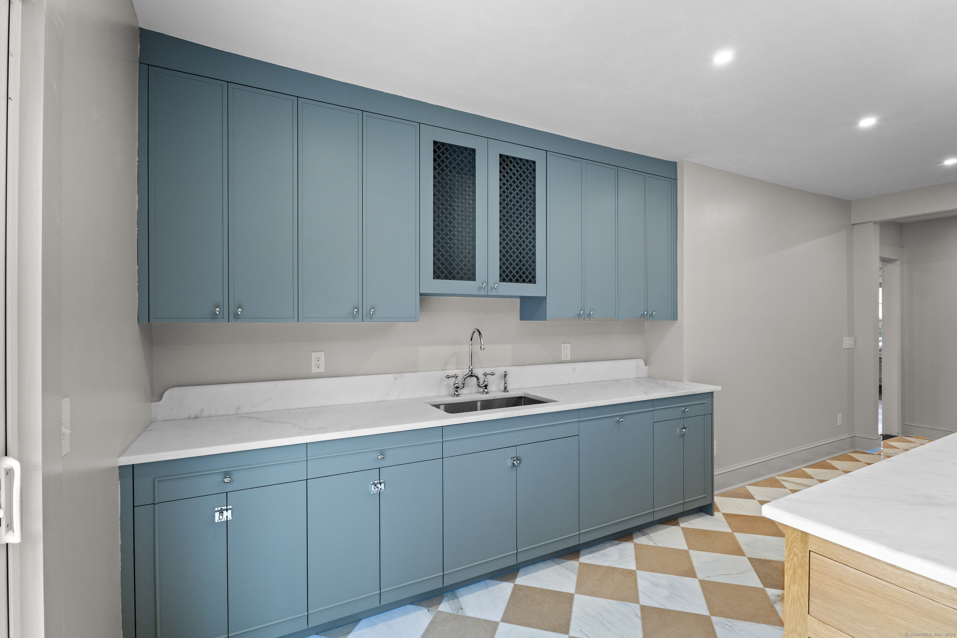 119 Westwood Road New Haven, CT 06515 - Photo 15 of 40 a bathroom with a sink and a mirror