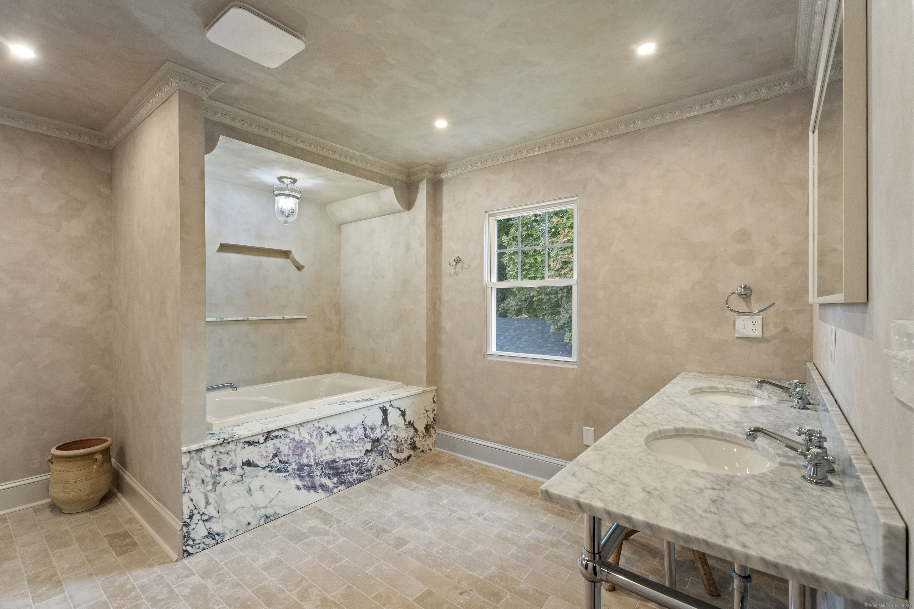 119 Westwood Road New Haven, CT 06515 - Photo 24 of 40 a bathroom with a sink and a mirror