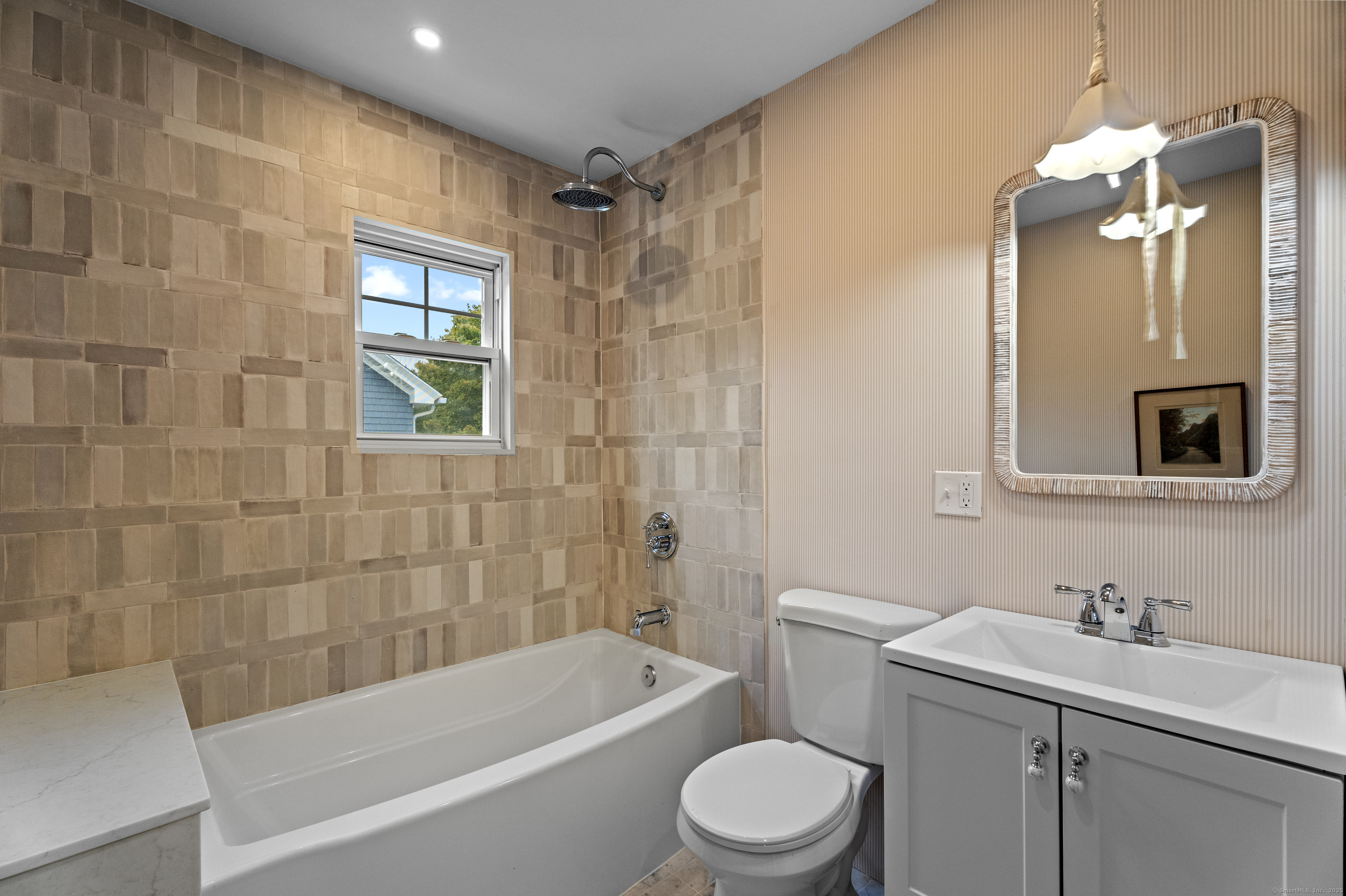 119 Westwood Road New Haven, CT 06515 - Photo 36 of 40 a bathroom with a sink a toilet and shower