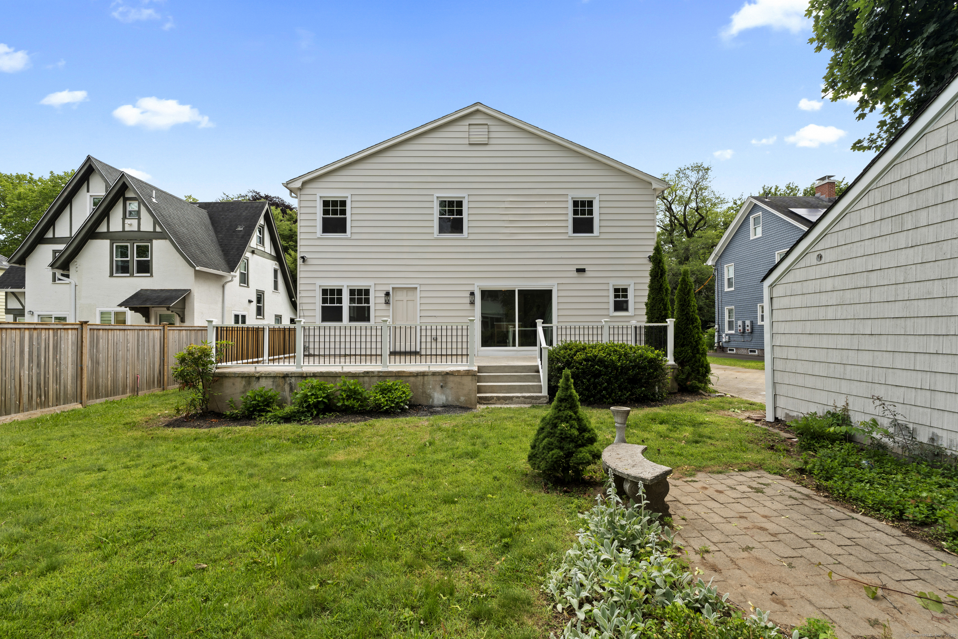 119 Westwood Road New Haven, CT 06515 - Photo 37 of 40 a view of a house with a yard