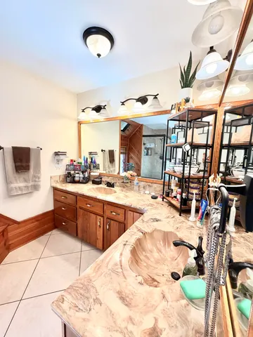 a view of staircase with a rug