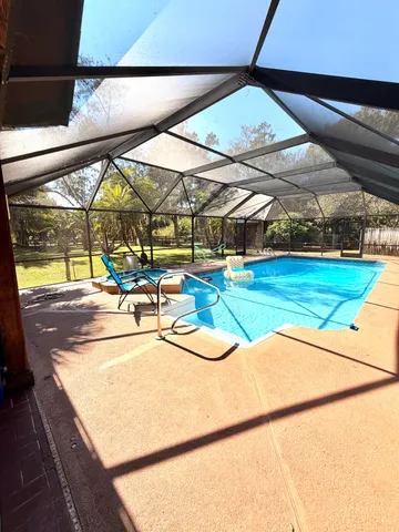 a view of street with large trees