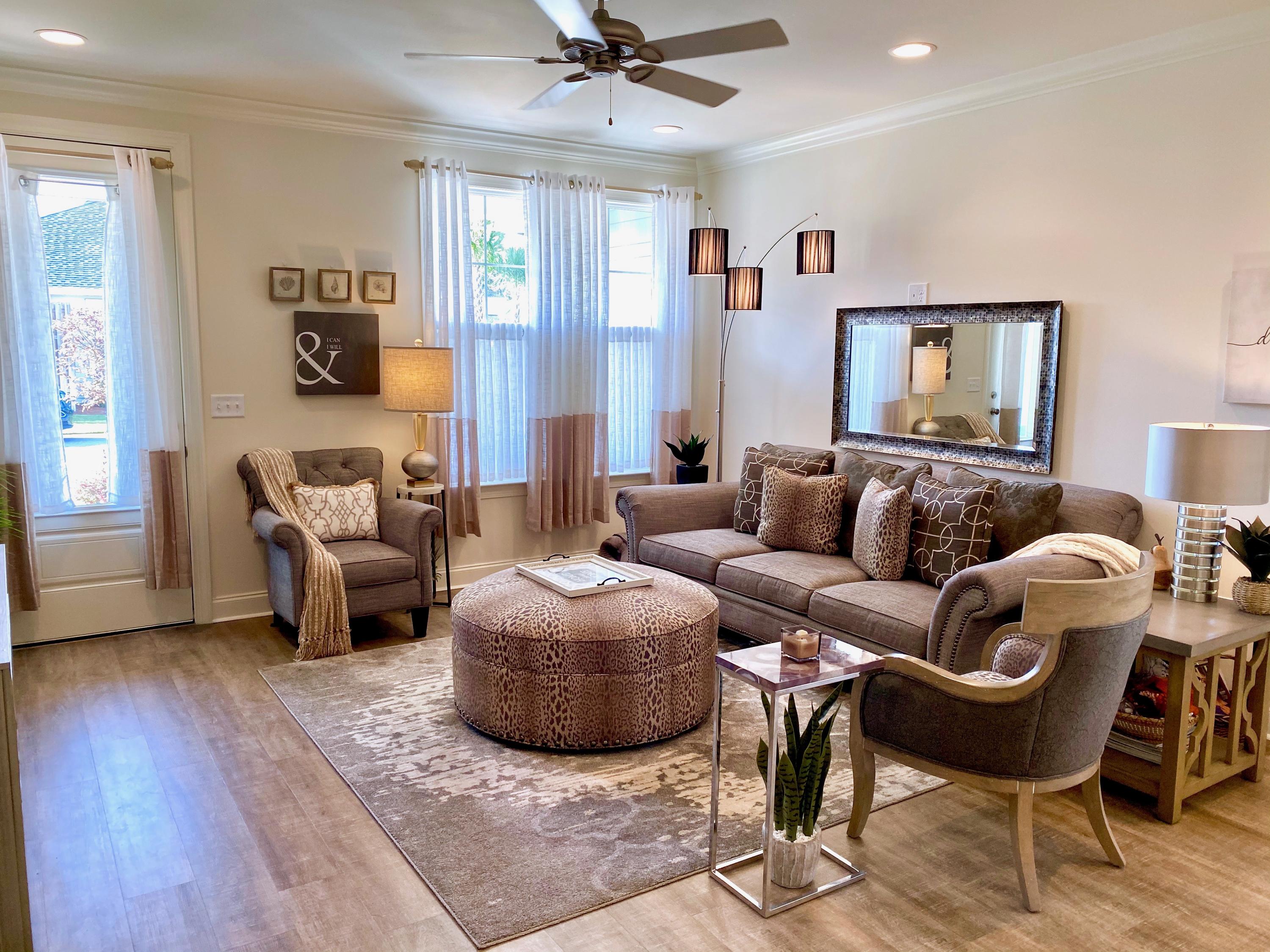 100 North Zander Way Santa Rosa Beach, FL 32459 - Photo 9 of 50 a living room with furniture and a wooden floor