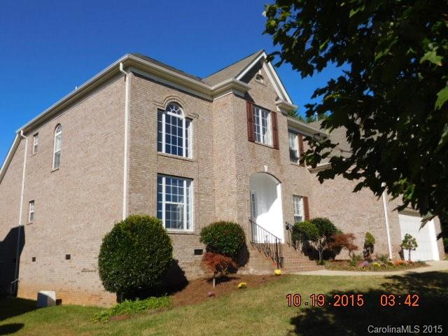 10004 Paradise Ridge Road, Unit 68 Charlotte, NC 28277 - Photo 2 of 24 a view of a house with a yard