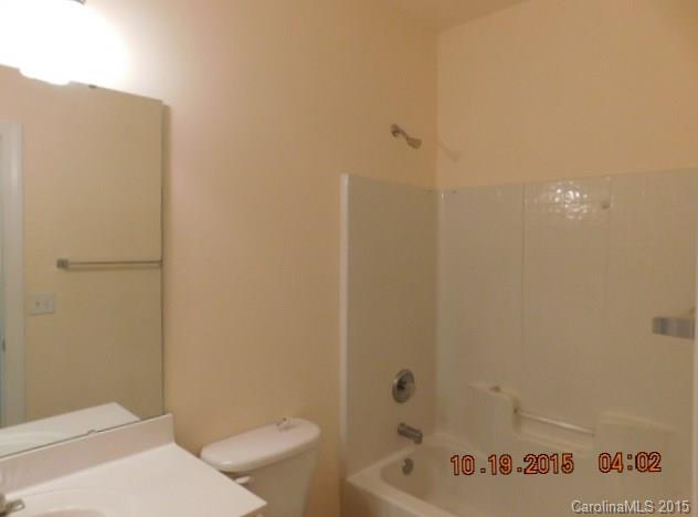 10004 Paradise Ridge Road, Unit 68 Charlotte, NC 28277 - Photo 20 of 24 a bathroom with a sink and toilet