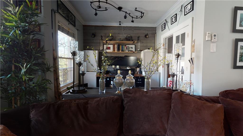 3216 Glenwood Road Brooklyn, NY 11210 - Photo 15 of 50 a view of a livingroom with furniture and a window