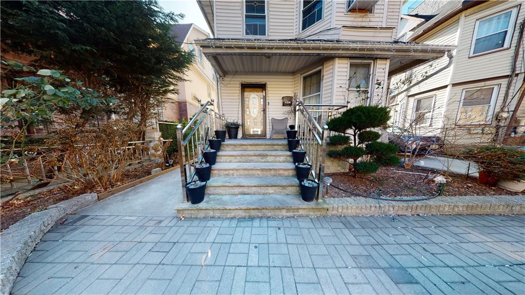 3216 Glenwood Road Brooklyn, NY 11210 - Photo 2 of 50 a view of a pathway of a house with entryway and plants