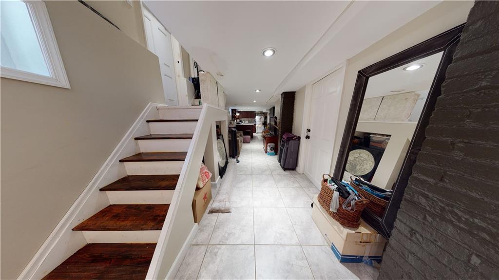 3216 Glenwood Road Brooklyn, NY 11210 - Photo 26 of 50 a view of entryway and hall with wooden floor