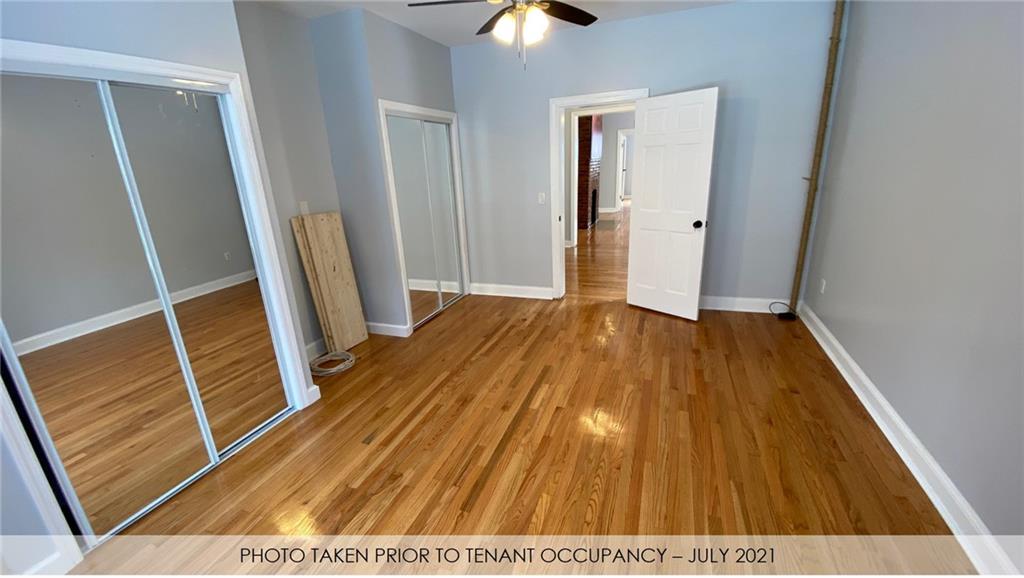 3216 Glenwood Road Brooklyn, NY 11210 - Photo 49 of 50 a view of front door with wooden floor