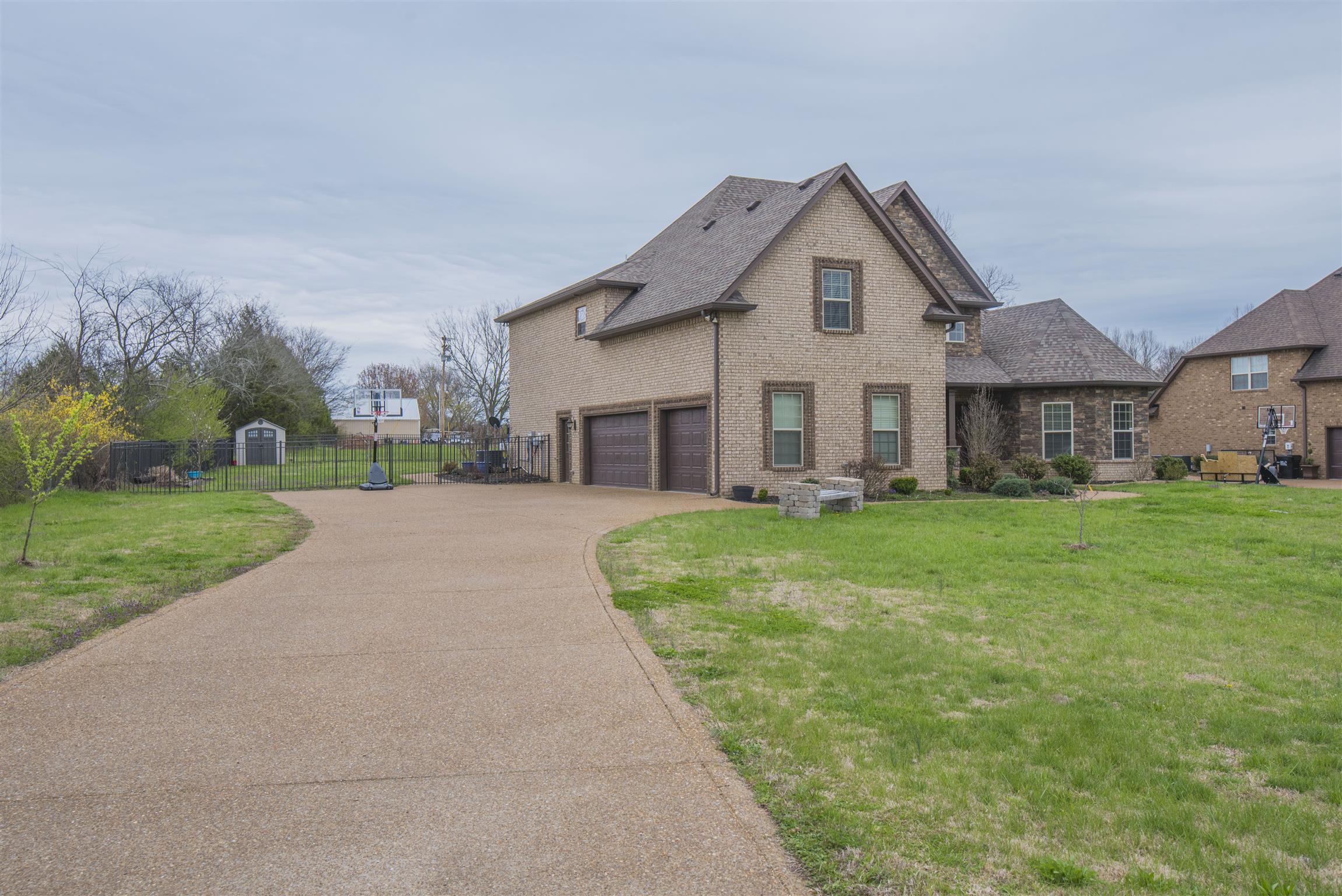 8160 Mona Road Murfreesboro, TN 37129 - Photo 29 of 29 This is a long driveway leading up to the 3 car garage.