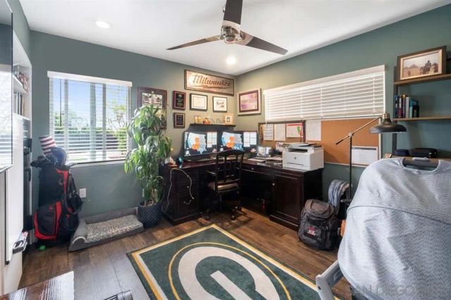 a bathroom with a sink toilet and mirror