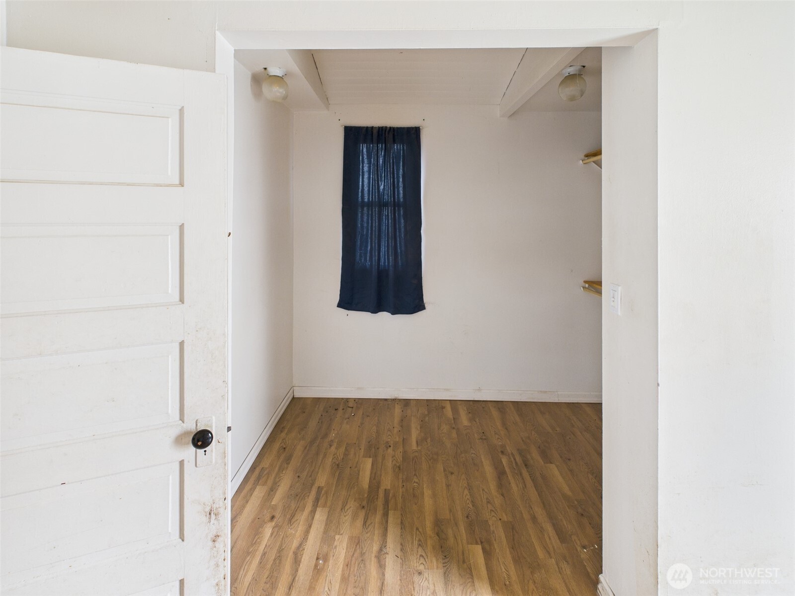 205 East Broadway Avenue Ritzville, WA 99169 - Photo 13 of 14 view of a room with wooden floor and white wall