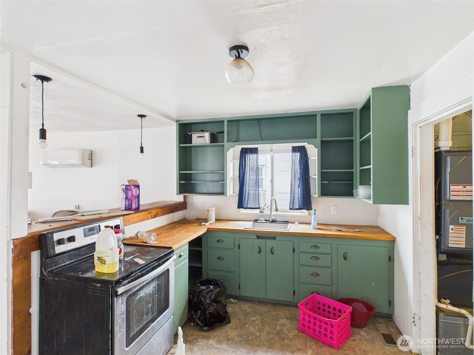 205 East Broadway Avenue Ritzville, WA 99169 - Photo 8 of 14 a room with storage and utility