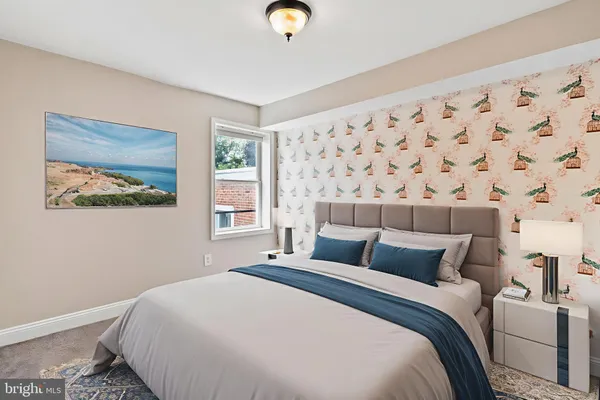 a bedroom with bed and a window