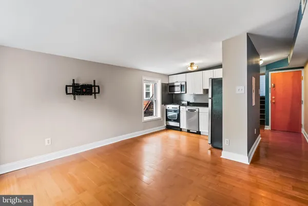 a view of a kitchen with a sink