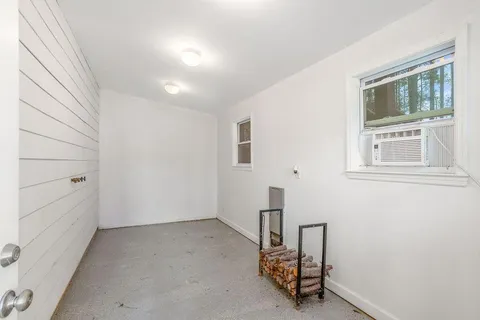 a view of a room with rack on the wall