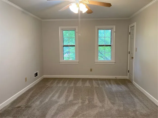 a bathroom with double sink and a mirror
