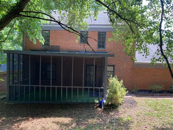 a view of a empty room with a window