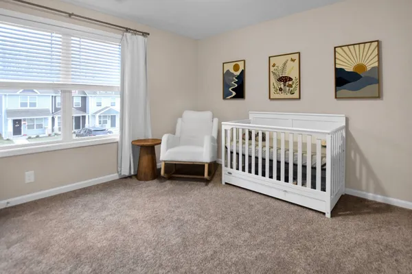 a view of livingroom with furniture and windows