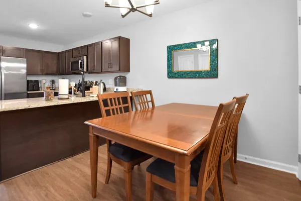 a view of a dining room with furniture