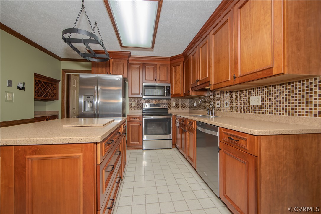 13319 Lady Ashley Road Midlothian, VA 23114 - Photo 17 of 41 a kitchen with stainless steel appliances granite countertop a sink a stove and a refrigerator
