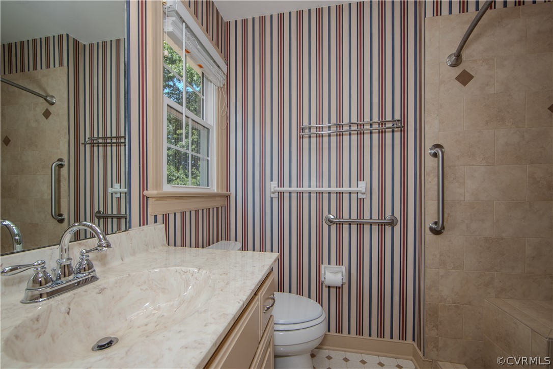13319 Lady Ashley Road Midlothian, VA 23114 - Photo 24 of 41 a bathroom with a granite countertop sink toilet and shower