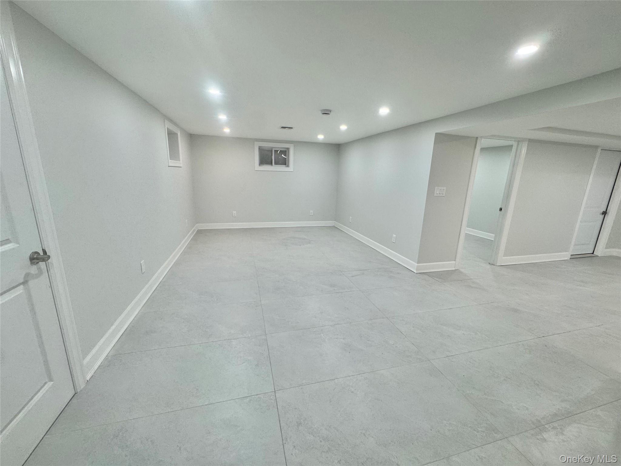 32 A Berkshire Road Great Neck, NY 11023 - Photo 30 of 38 Finished basement featuring recessed lighting