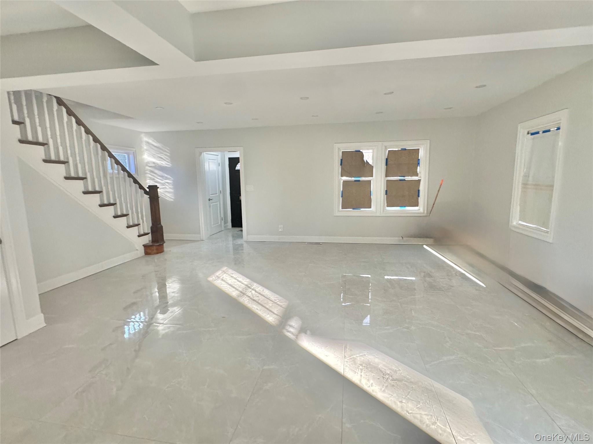 32 A Berkshire Road Great Neck, NY 11023 - Photo 32 of 38 Foyer leads to living room