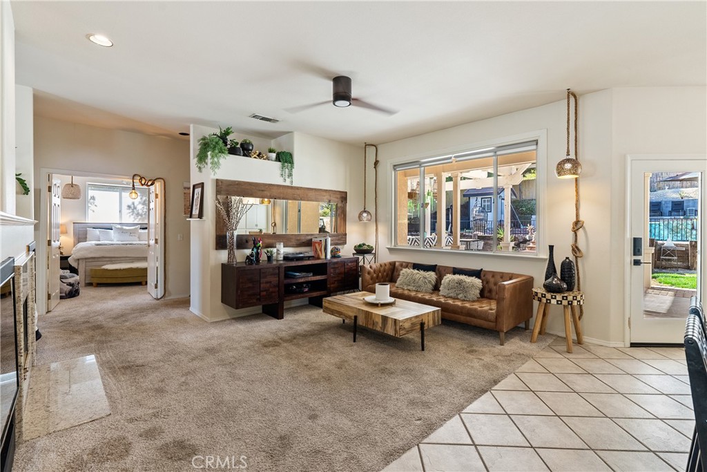 1329 Crown Way Paso Robles, CA 93446 - Photo 13 of 57 a living room with furniture and a large window