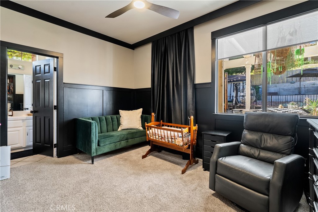 1329 Crown Way Paso Robles, CA 93446 - Photo 22 of 57 a living room with furniture and a large window