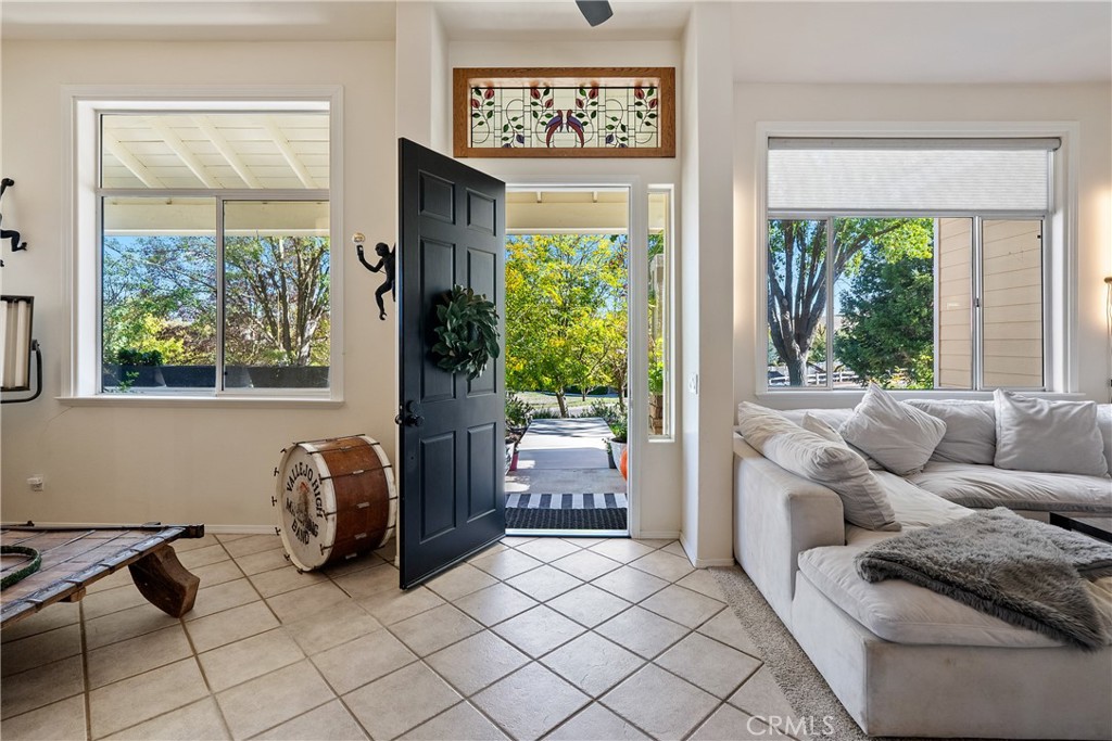 1329 Crown Way Paso Robles, CA 93446 - Photo 7 of 57 a living room with furniture and a large window